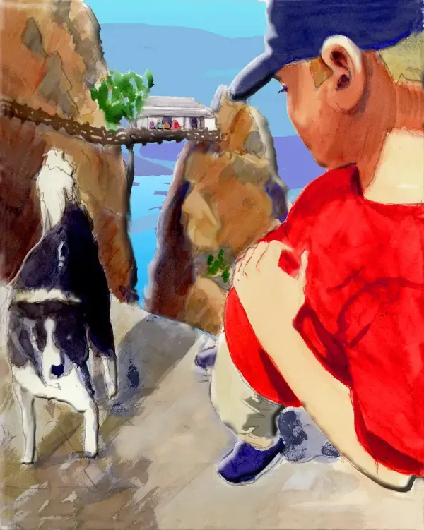 Boy and dog near cliffside house