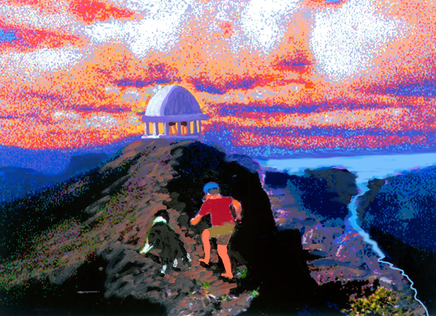 Hikers approaching mountain summit at sunset
