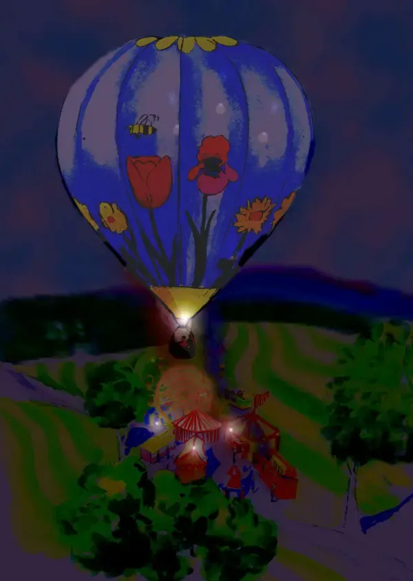 Illuminated balloon floating above tents